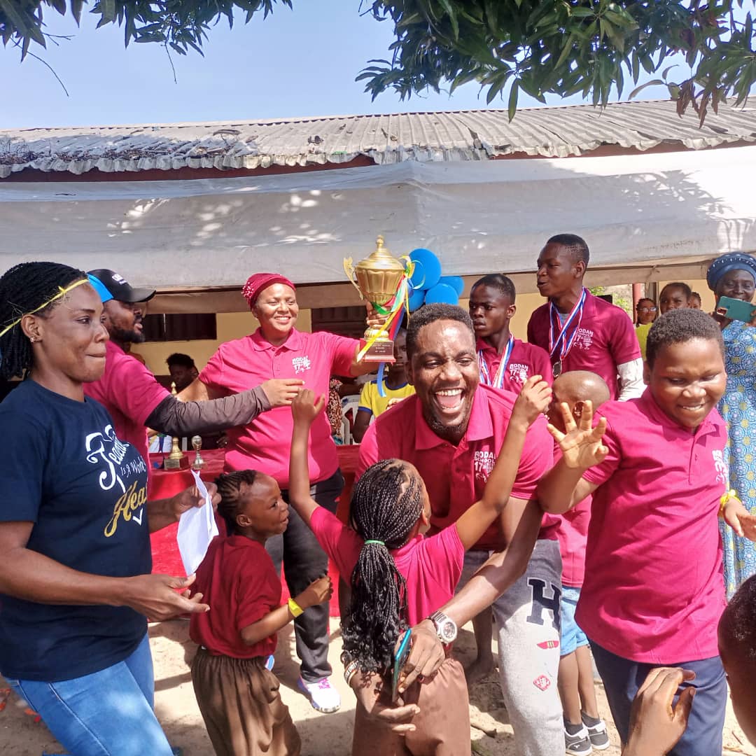 Children And Teachers Celebrating Sports Tournament Win